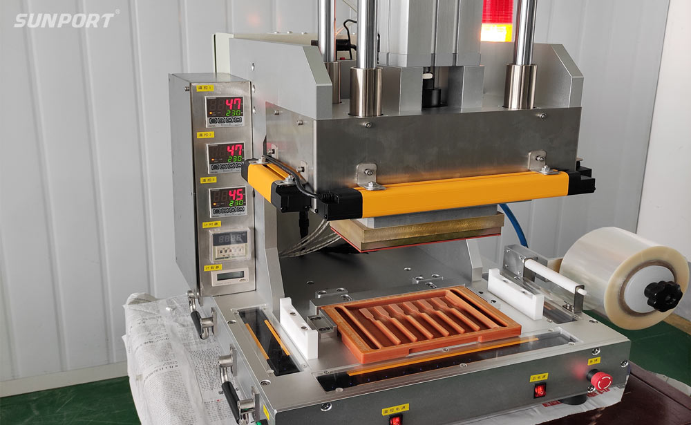 喜讯！尊龙中国官网第二代热压封膜机研发成功！